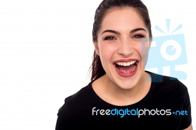 Young Woman Laughing Loud Stock Photo