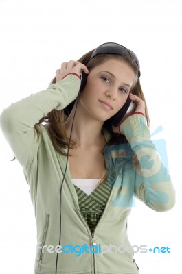 Young Woman Listening To Music Stock Photo