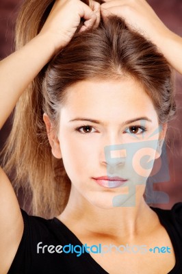 Young Woman On Dark Background Stock Photo