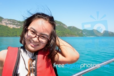 Young Woman On The Boat Stock Photo