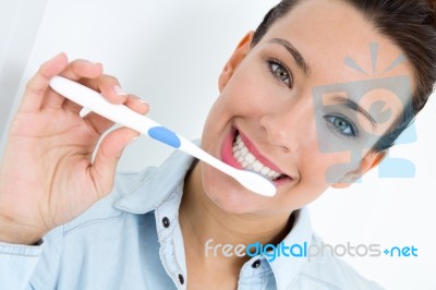 Young Woman Picking His Teeth Stock Photo