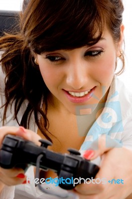 young Woman Playing Video game Stock Photo