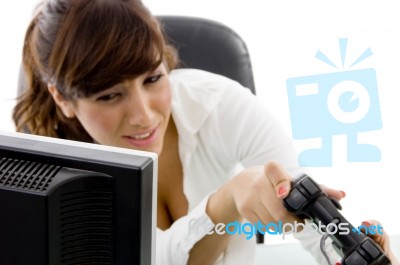 young Woman Playing Video game Stock Photo