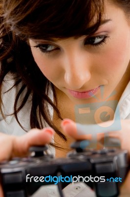 young Woman Playing Video game Stock Photo