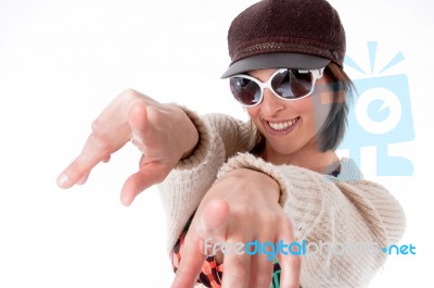 Young Woman Pointing Out Stock Photo