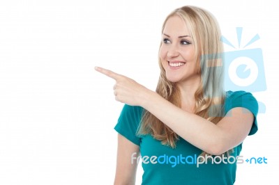 Young Woman Pointing Out Right Stock Photo