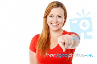 Young Woman Pointing You Out Stock Photo