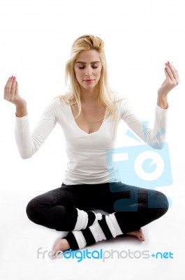 Young Woman Practicing Yoga Stock Photo