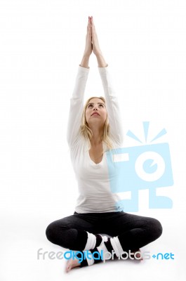 Young Woman Practicing Yoga Stock Photo