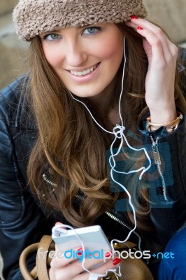 Young Woman Shopping In The City With His Mobile Phone Stock Photo