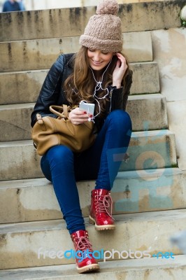 Young Woman Shopping In The City With His Mobile Phone Stock Photo