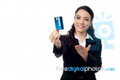 Young Woman Showing A Credit Card Stock Photo