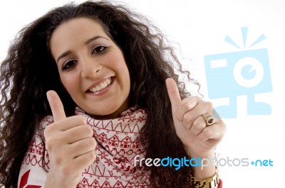 Young Woman Showing Thumb Up Stock Photo