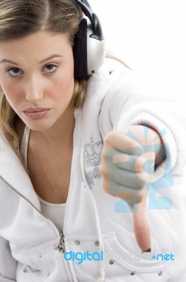 Young Woman Showing Thumbs Down Stock Photo