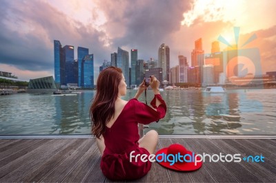 Young Woman Take A Photos In Singapore Stock Photo