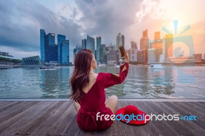 Young Woman Take A Photos In Singapore Stock Photo