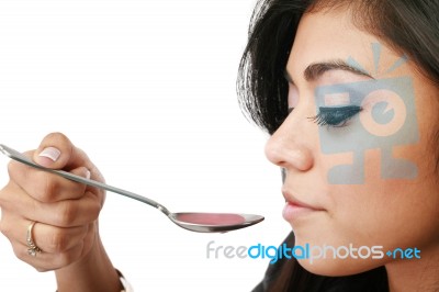 Young Woman Taking Medicine Stock Photo