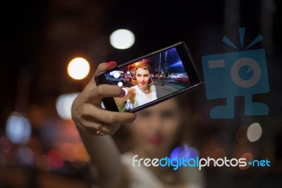 Young Woman Taking Selfie In The City Stock Photo