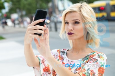 Young Woman Talking A Selfie Stock Photo