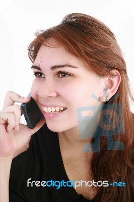 Young Woman Talking Over Cellphone Stock Photo