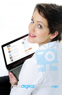 Young Woman Using Laptop Stock Photo