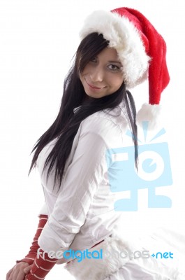 Young woman wearing santa hat Stock Photo