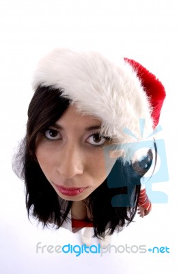 Young Woman wearing santa hat Stock Photo