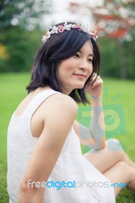 Young Woman With A Crown Of Flowers Stock Photo