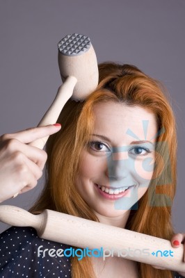 Young Woman With A Wooden Rolling Pin Stock Photo