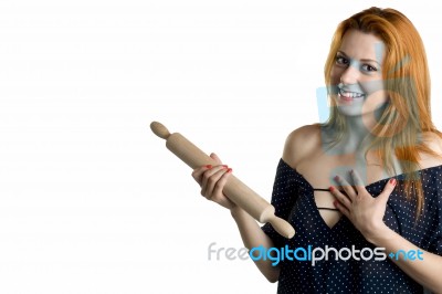 Young Woman With A Wooden Rolling Pin Stock Photo