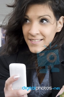 Young Woman With Cell Phone Stock Photo