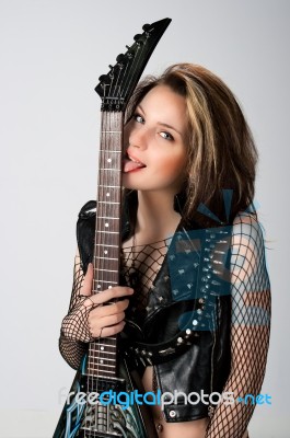 Young Woman With Guitar Stock Photo