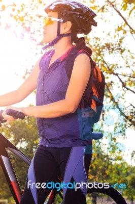 Young Woman With Mountain Bike Stock Photo