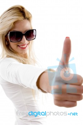 Young Woman With Thumbs Up Stock Photo