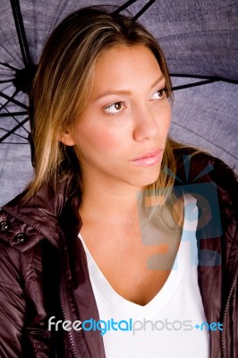 Young Woman With Umbrella Stock Photo