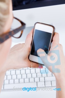 Young Woman Working From Home On The Computer And Talking On The… Stock Photo