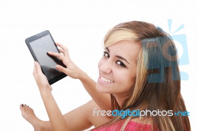 Young Women Sitting With Tablet PC Stock Photo