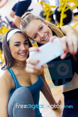 Young Women Taking A Selfie In The Gym Stock Photo