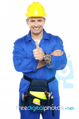 Young Worker Showing Thumbs Up Stock Photo