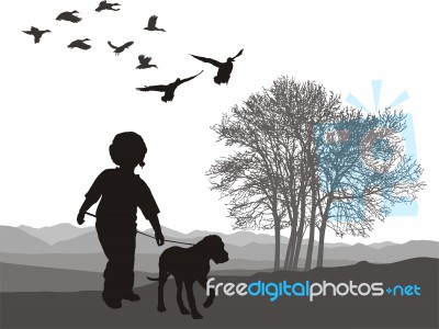 Youngster And Dog Walking Stock Image