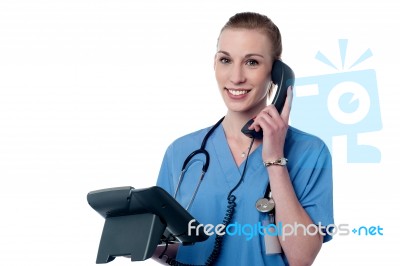 Yyoung Female Doctor On Phone Stock Photo