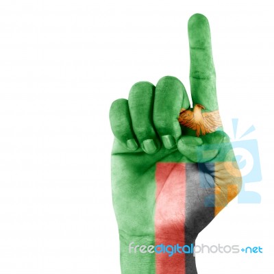 Zambia Flag On Pointing Up Hand Stock Photo