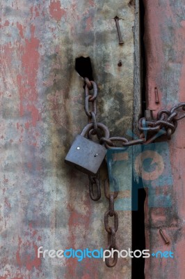 Zinc Door With Padlock Stock Photo