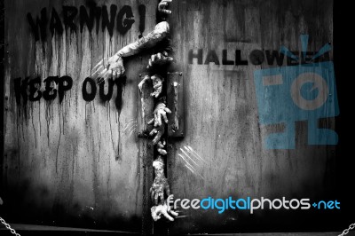 Zombie Hand Through The Door Stock Photo