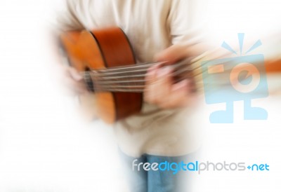 Zoom Blur Guitar Player Stock Photo