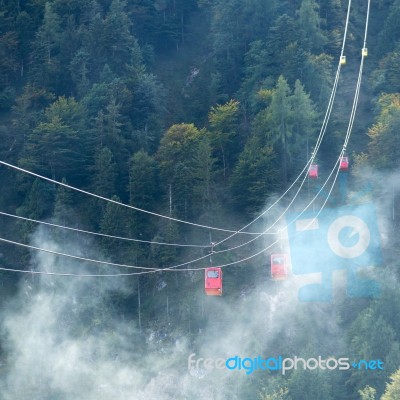 Zwölferhorn Mountain Cable Car Running Down To St Gilgen Stock Photo