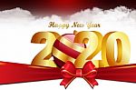 2020 Happy Newyear. Golden Letter Decorated With Ribbon Stock Photo