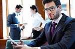 A Business Team Of Three In Office And Planning Work Stock Photo