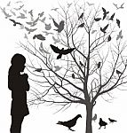 A Girl And Birds Stock Photo