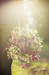 A Romantic Couple Holding Valentines Gift And Flowers, Vintage T Stock Photo